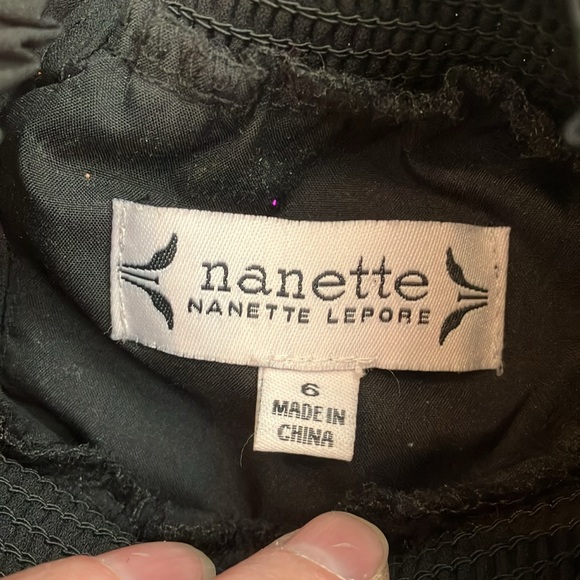 Fabulous LBD blouson dress featuring a smocked waist & accordion pleats - Picture 14 of 15